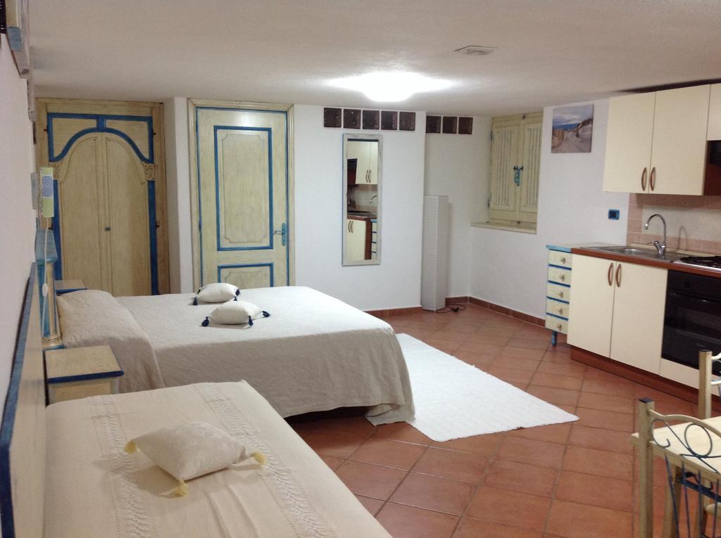 Addisora Appartamenti Cala Liberotto Habitación foto